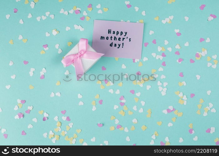 happy mothers day inscription with small gift box