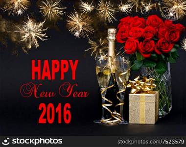 Happy New Year 2016! Greetings card concept. Red roses, bottle of champagne, golden gift. Golden fireworks on black background