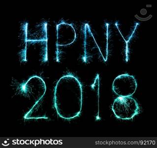 Happy new year 2018 written with Sparkle firework at night
