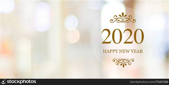 Happy New Year 2020 on blur abstract bokeh background with copy space for text, new year greeting card, banner