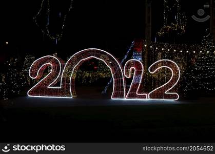 happy new year 2022 festive lights. copy space background.