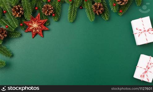 Happy new year, christmas day concept top view flat lay fir tree branches, gift box and decoration