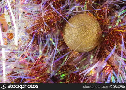 Happy New Year Christmas tree decorates on background bokeh of side flickering light bulbs garlands for family holiday.