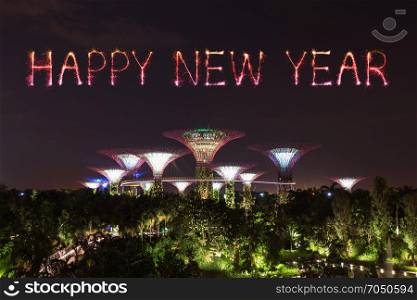 Happy new year firework Sparkle with Gardens by the bay with light at night, Singapore