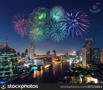 happy new year fireworks celebrating over Chao Phraya river cityscape in Bangkok city at night, Thailand