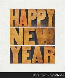 Happy New Year greeting card - digital painting applied to text abstract in vintage letterpress wood type blocks