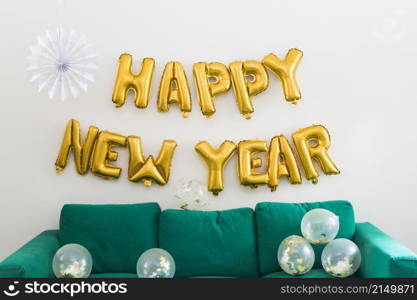 happy new year inscription from yellow balloons