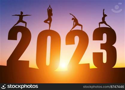 Happy New Year Numbers 2023, Silhouette woman practicing yoga early morning sunrise over the horizon background, Health and Happy new year concept.