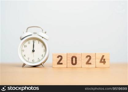 Happy New Year with vintage alarm clock and 2024 block. Christmas, New Start, Resolution, countdown, Goals, Plan, Action and Motivation Concept