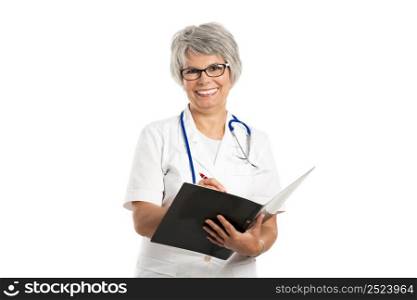 Happy old female doctor holding a folder, isolated on white