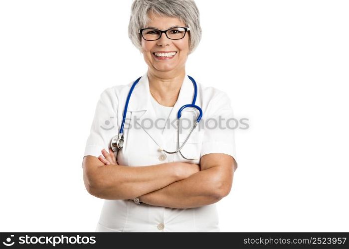 Happy old female doctor with hands folded, isolated on white