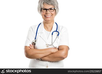 Happy old female doctor with hands folded, isolated on white