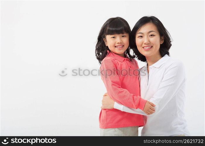 Happy parent and daughter