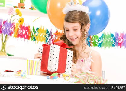 happy party girl with balloons and gift box