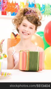 happy party girl with balloons and gift box