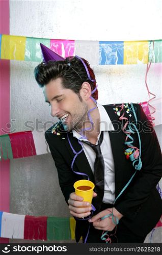 Happy party young man drinking enjoying alone laughing