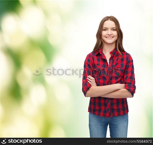 happy people concept - happiness and people concept - smiling young woman in casual clothes with crossed arms