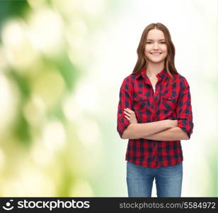 happy people concept - happiness and people concept - smiling young woman in casual clothes with crossed arms