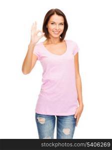 happy people concept - smiling woman in blank pink t-shirt showing ok gesture