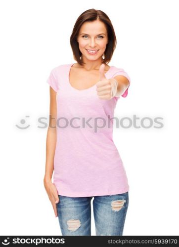 happy people concept - woman in blank pink t-shirt showing thumbs up. woman showing thumbs up