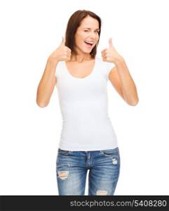 happy people concept - woman in blank white t-shirt showing thumbs up and winking