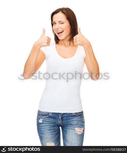 happy people concept - woman in blank white t-shirt showing thumbs up and winking. woman showing thumbs up and winking