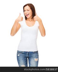 happy people concept - woman in blank white t-shirt showing thumbs up and winking. woman showing thumbs up and winking