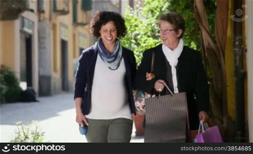 Happy people, grandmother, woman, mother with pregnant daughter shopping, having fun and walking in city street. 5of7