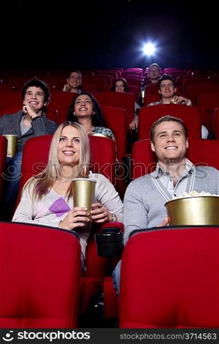 Happy people in the cinema