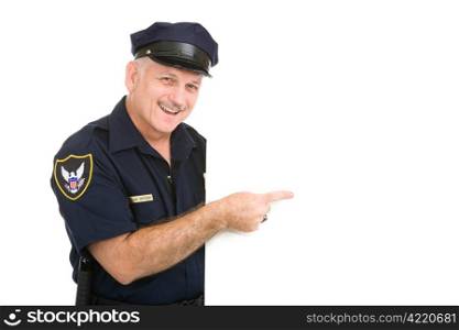 Happy policeman pointing at blank white space. Isolated design element.
