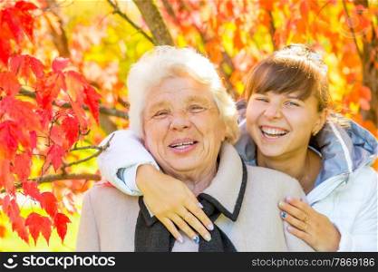 Happy portrait of grandmother and granddaughter