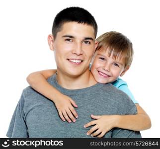 Happy portrait of the father and son of six years. Isolated on white