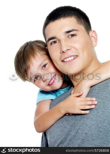 Happy portrait of the father and son of six years. Isolated on white