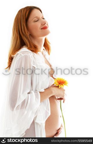 happy pregnant lady with flower over white background