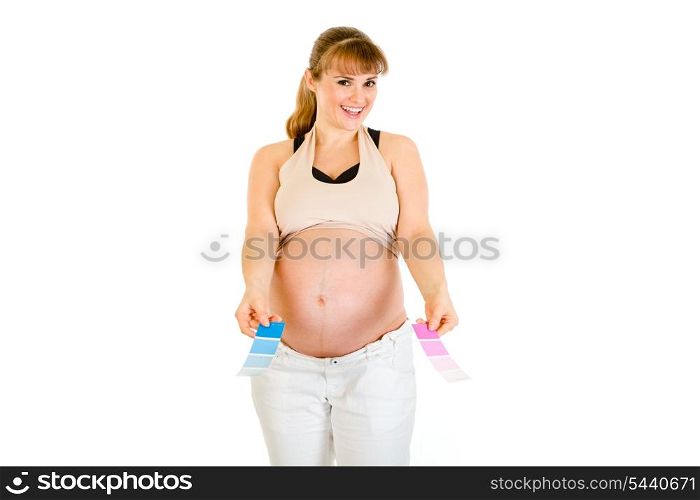 Happy pregnant woman holding color paint samples isolated on white&#xA;