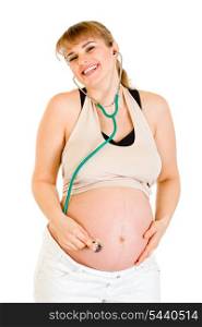 Happy pregnant woman holding stethascope on her belly isolated on white&#xA;
