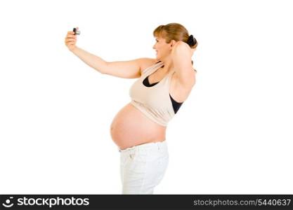 Happy pregnant woman photographing herself isolated on white&#xA;