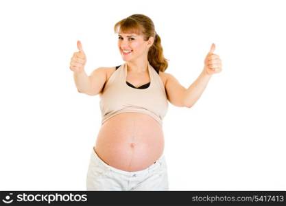 Happy pregnant woman showing thumbs up gesture isolated on white&#xA;