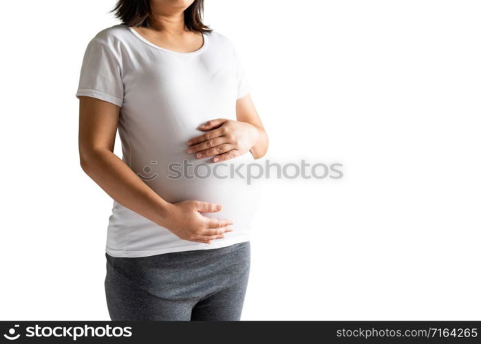 Happy pregnant woman taking care of her child isolated on white background. The young expecting mother holding baby in pregnant belly. Maternity prenatal care and woman pregnancy concept.