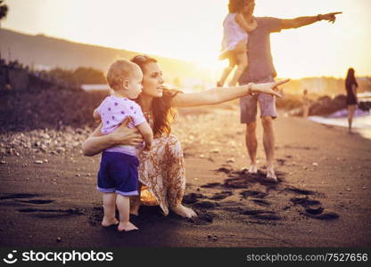 Happy, relaxed family on a tropical beach