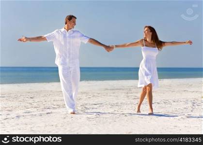 Happy Romantic Couple Dancing Holding Hands on A Tropical Beach