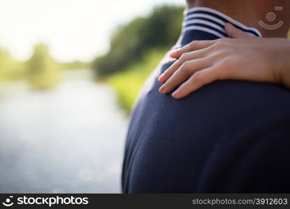 Happy romantic couple on river embracing each other. Close up photo