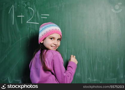 happy school girl on math classes finding solution and solving problems