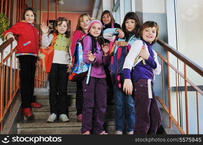 happy school girls running outdoor at sunny autumn day