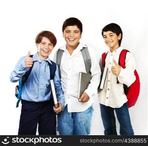 Happy schoolboys with thumbs up, back to school, boys holding books and smiling, isolated on white background, teenage education concept