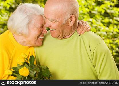 Happy senior couple in love outdoors