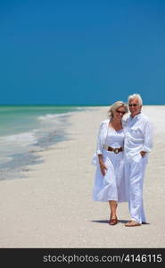 Happy Senior Couple Laughing on Tropical Beach