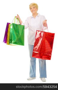 Happy senior woman with bags isolated