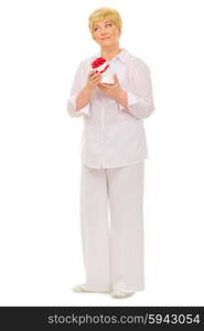 Happy senior woman with gift isolated