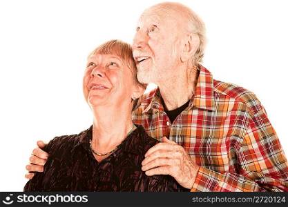 Happy seniuor couple looking up